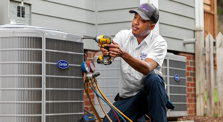 Blanton's service professional performing a repair service on an AC unit