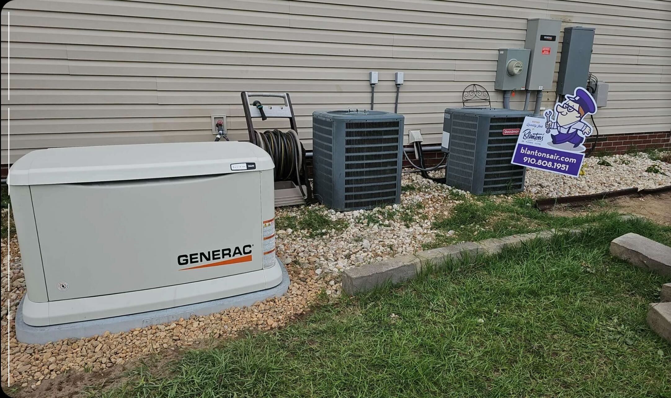 Generac generator outside a home with a Blanton's sign next to it