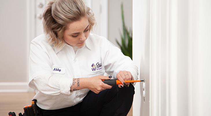 Blanton's service professional repairing a home's electrical outlets