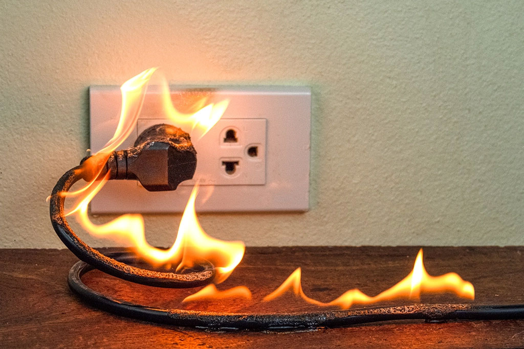 outlet on fire after electrical surge