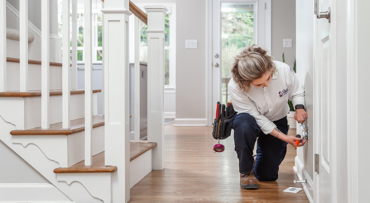 Blanton's service professional repairing an electrical outlet